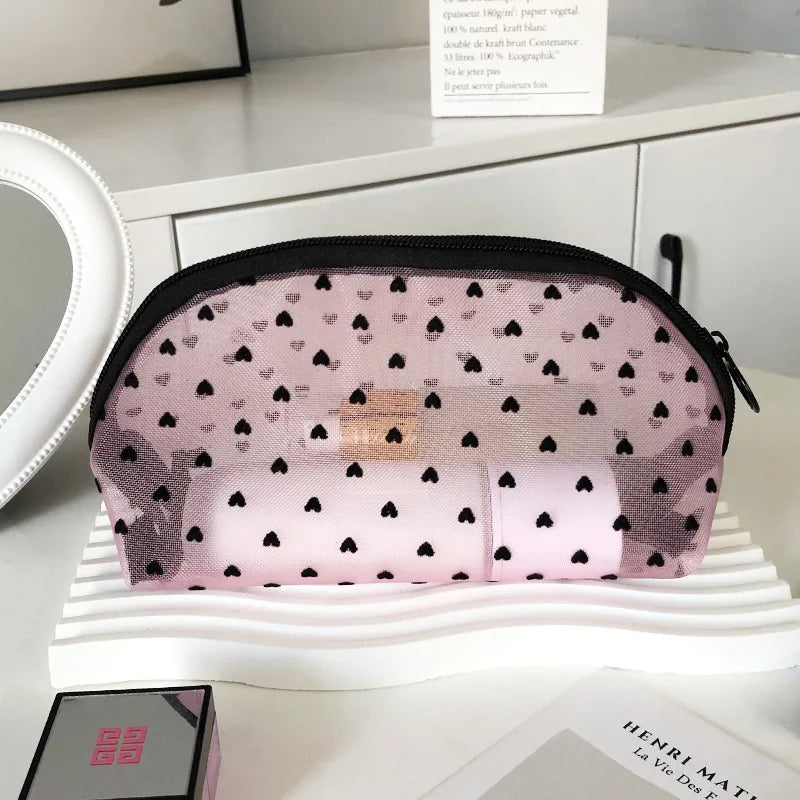 Trousse de toilette dentelle transparente – Élégance et légèreté