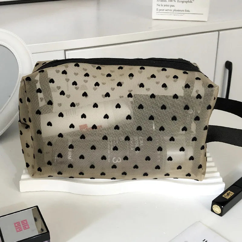 Trousse de toilette dentelle transparente – Élégance et légèreté