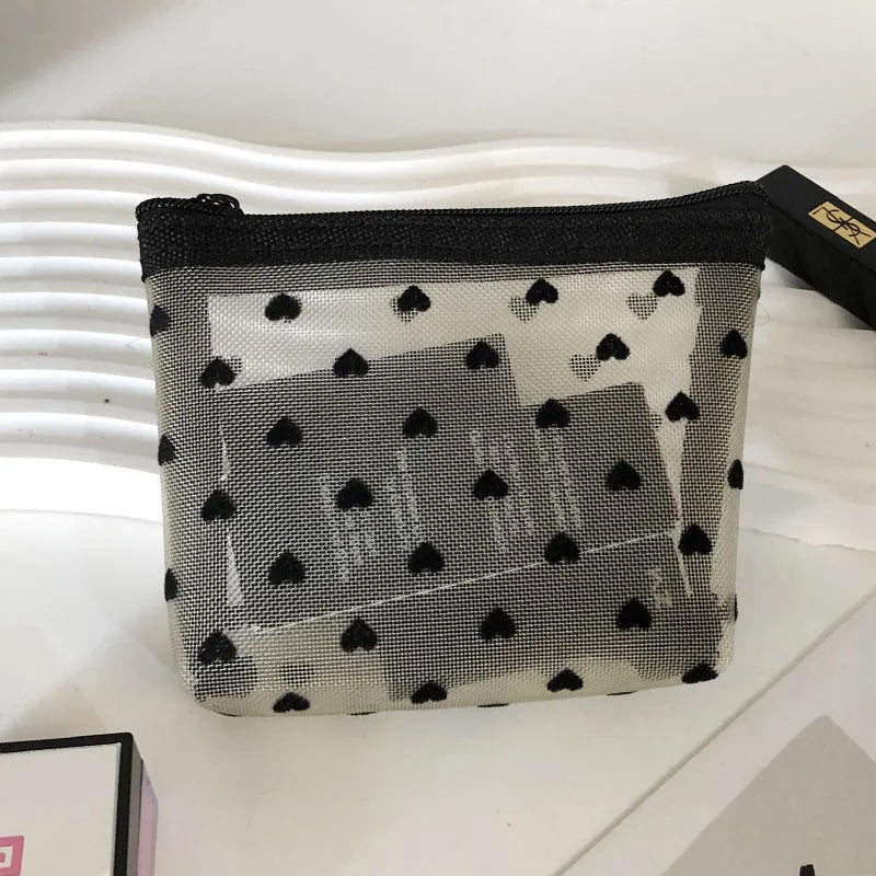 Trousse de toilette dentelle transparente – Élégance et légèreté