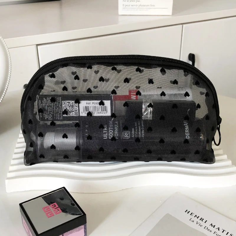 Trousse de toilette dentelle transparente – Élégance et légèreté